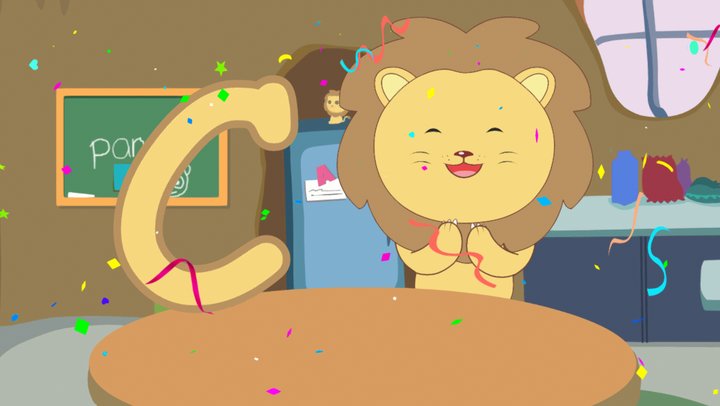 A cartoon lion celebrating next to a big letter C, with confetti, in a classroom.